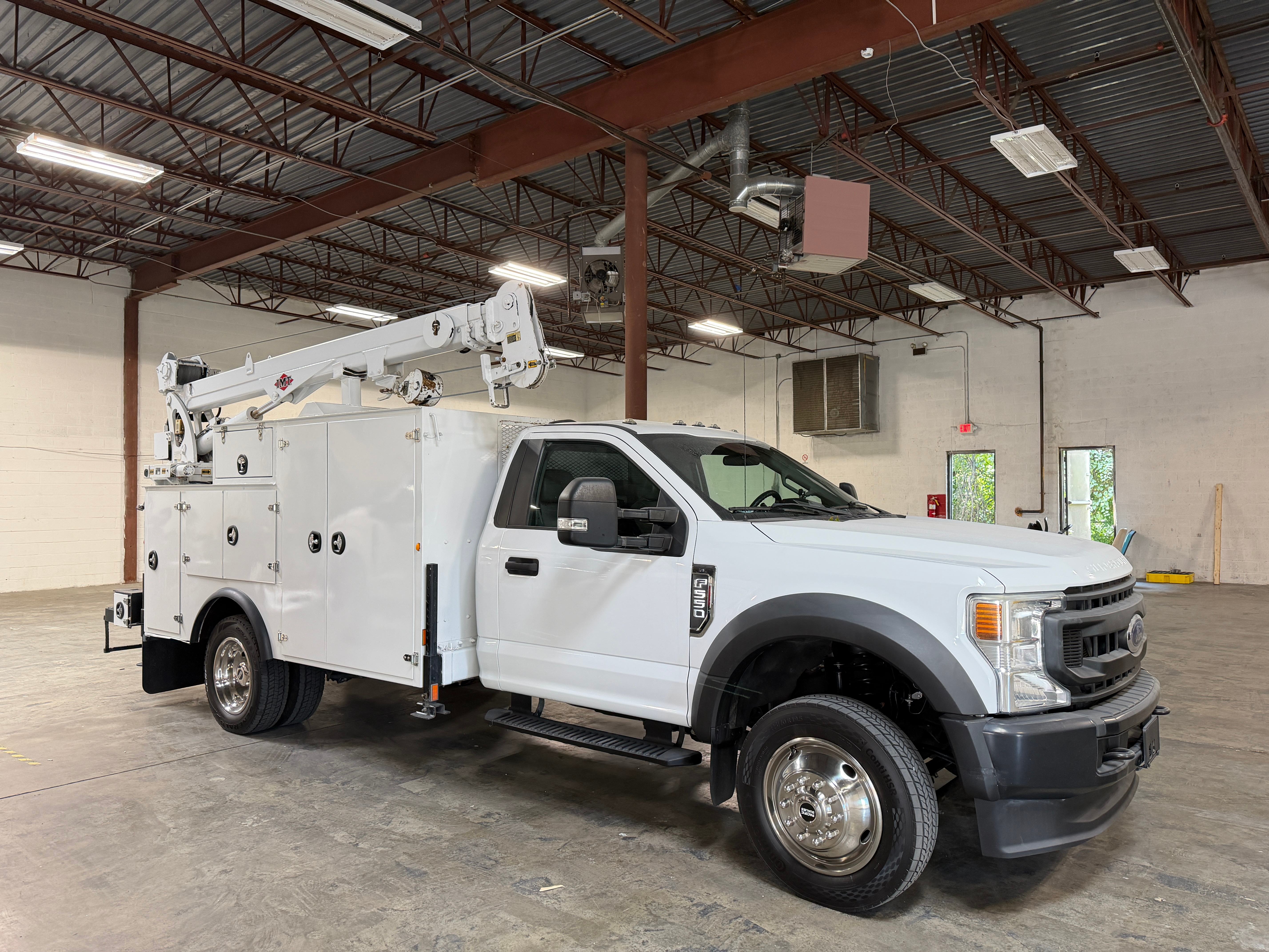 Forge Rise Hydraulics Ford F-550 service truck with a mounted IMT telescopic crane